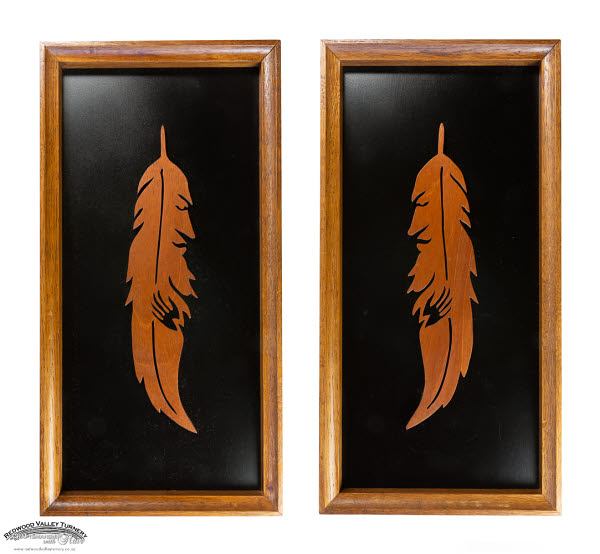 Pair of Mahogany Feather Men, 2 Frames