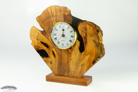 Rimu Burl Clock with 70mm insert and Black Resin Infill